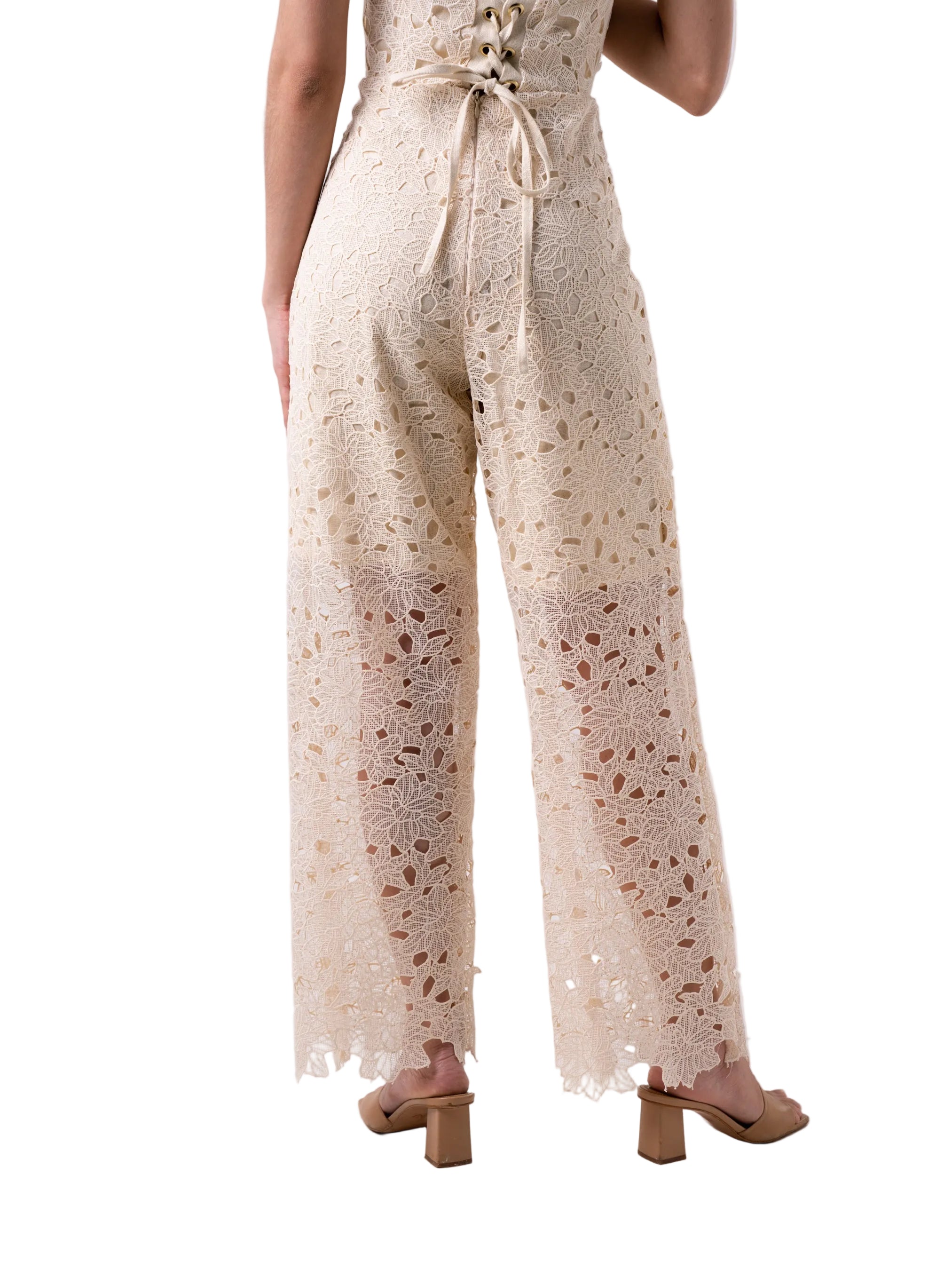 Pant that features a high waisted straight leg silhouette, with short lining and back zipper closure.