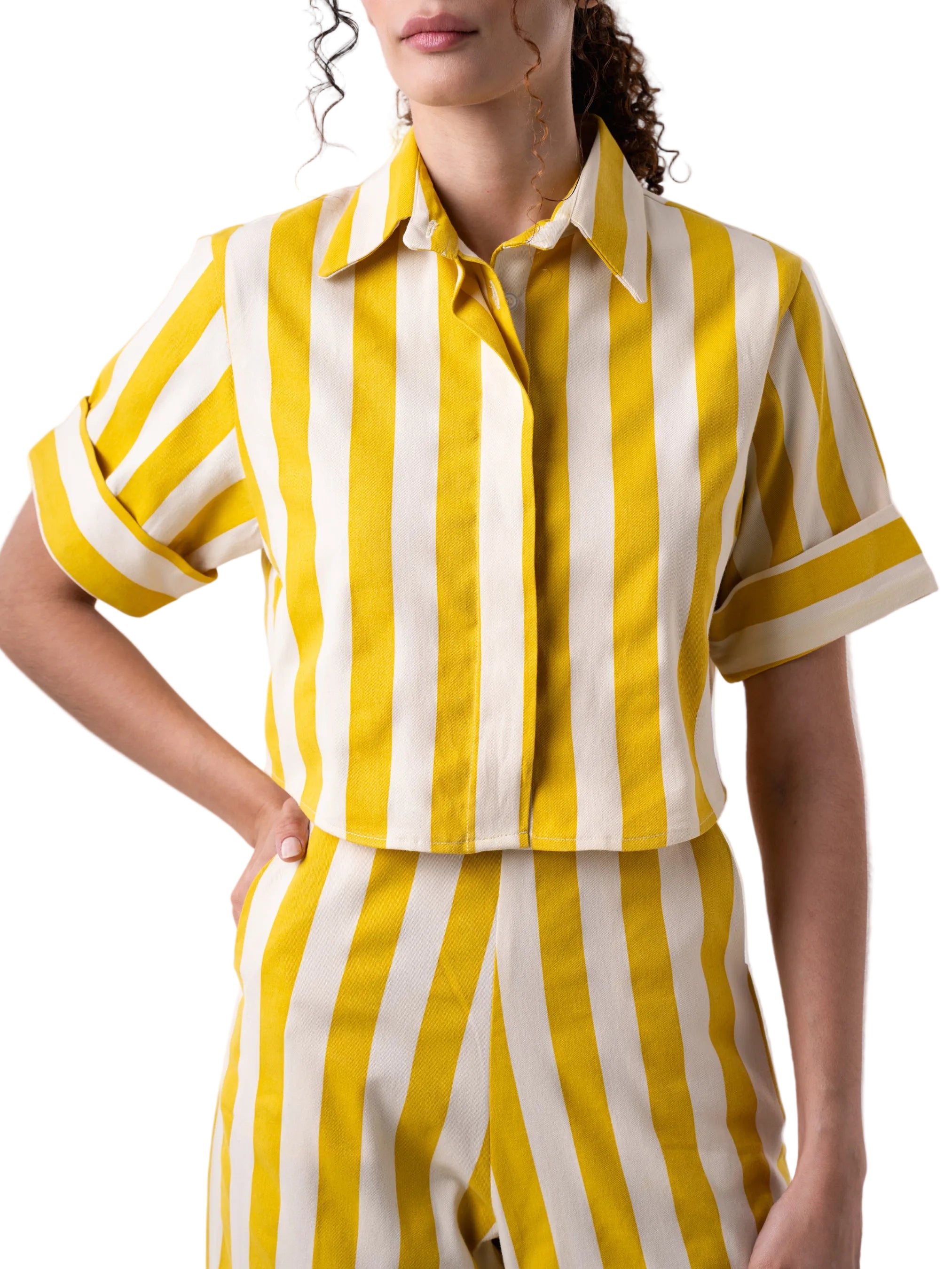 Top that features a classic button down with short sleeves and cuff detail.
