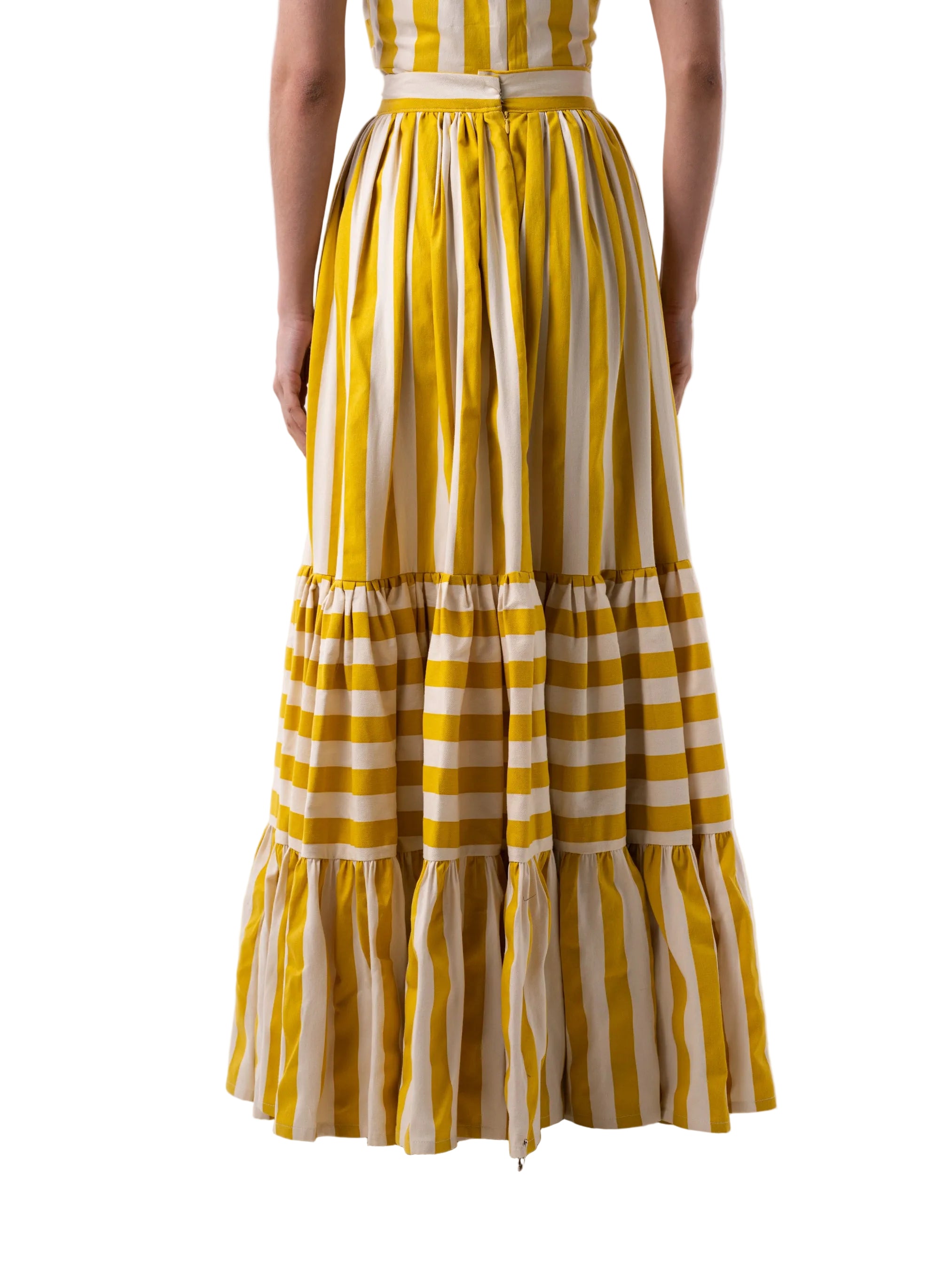 Skirt that features an A-Line three-tiered gathered floor length skirt with zipper closure.
