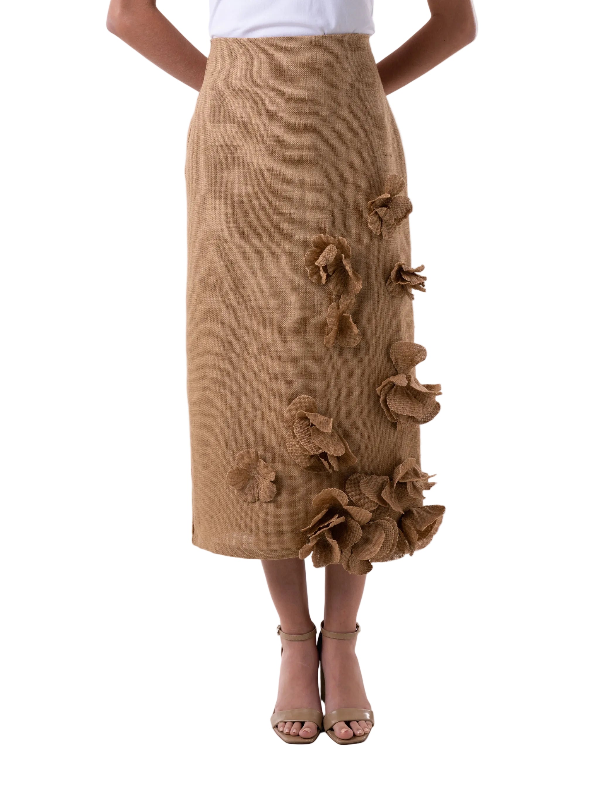 Skirt that features a high waisted pencil skirt silhouette with hand embroidered fabric flowers.