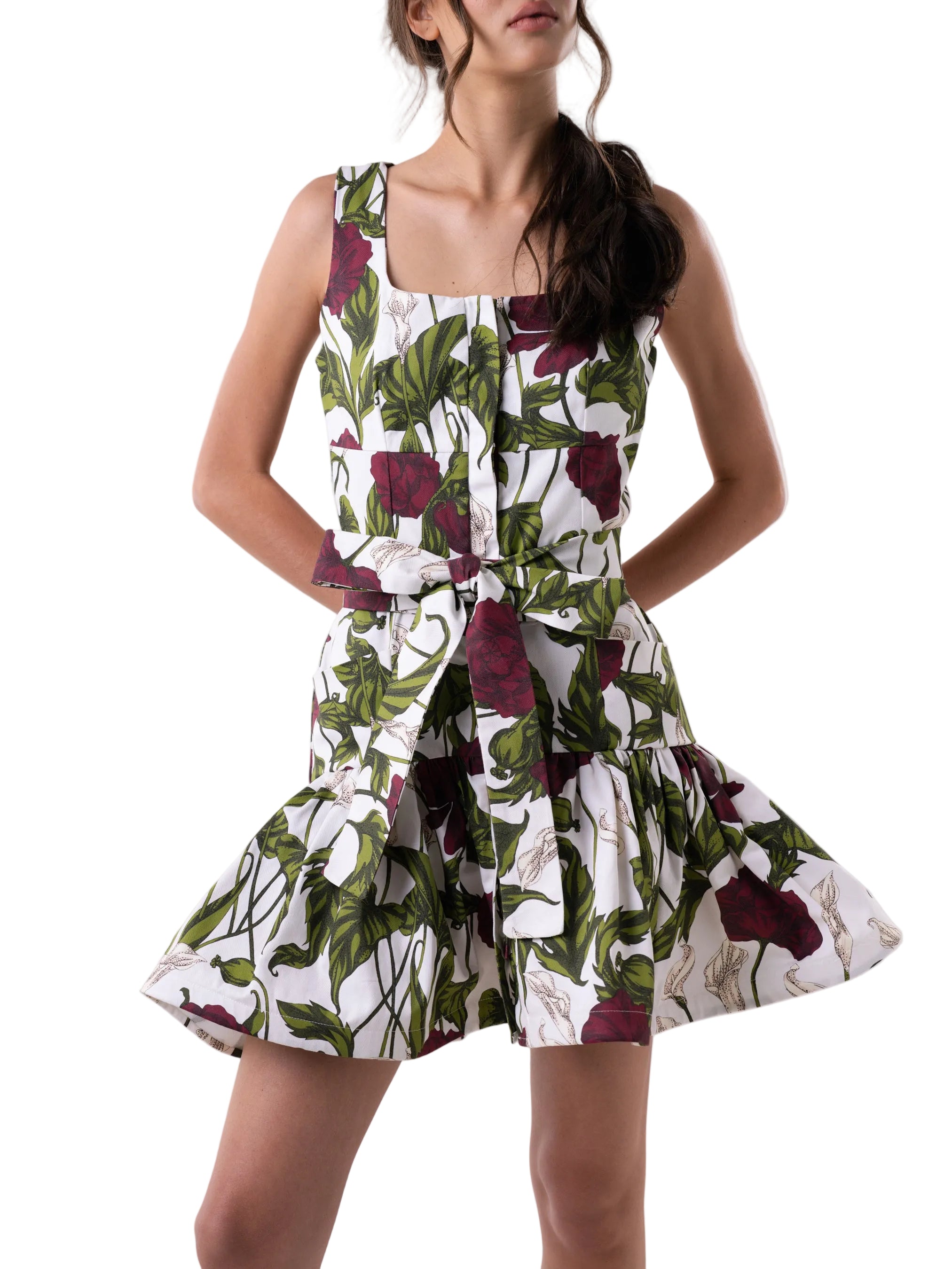 Dress features a square neck, above the knee length, sleeveless dress with front button down closure and gathered skirt.