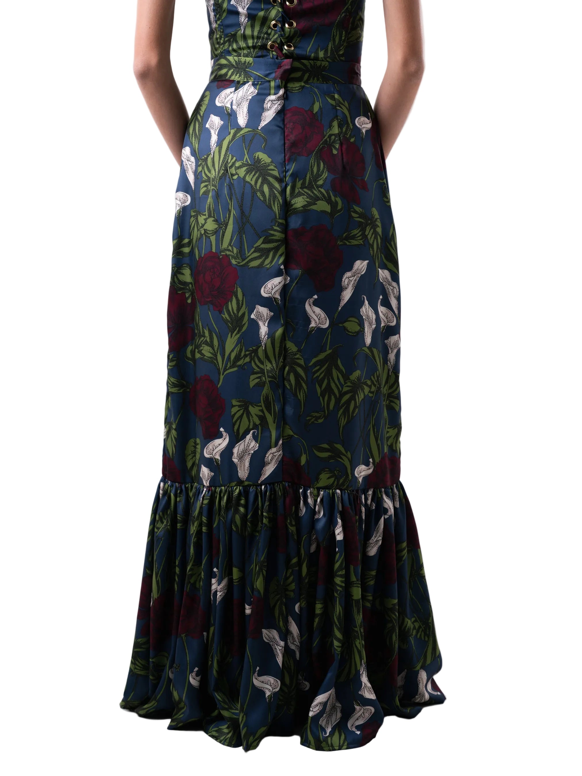 Skirt that features a high waisted soft A line silhouette finished with a gathered panel below the knee and back zipper closure.