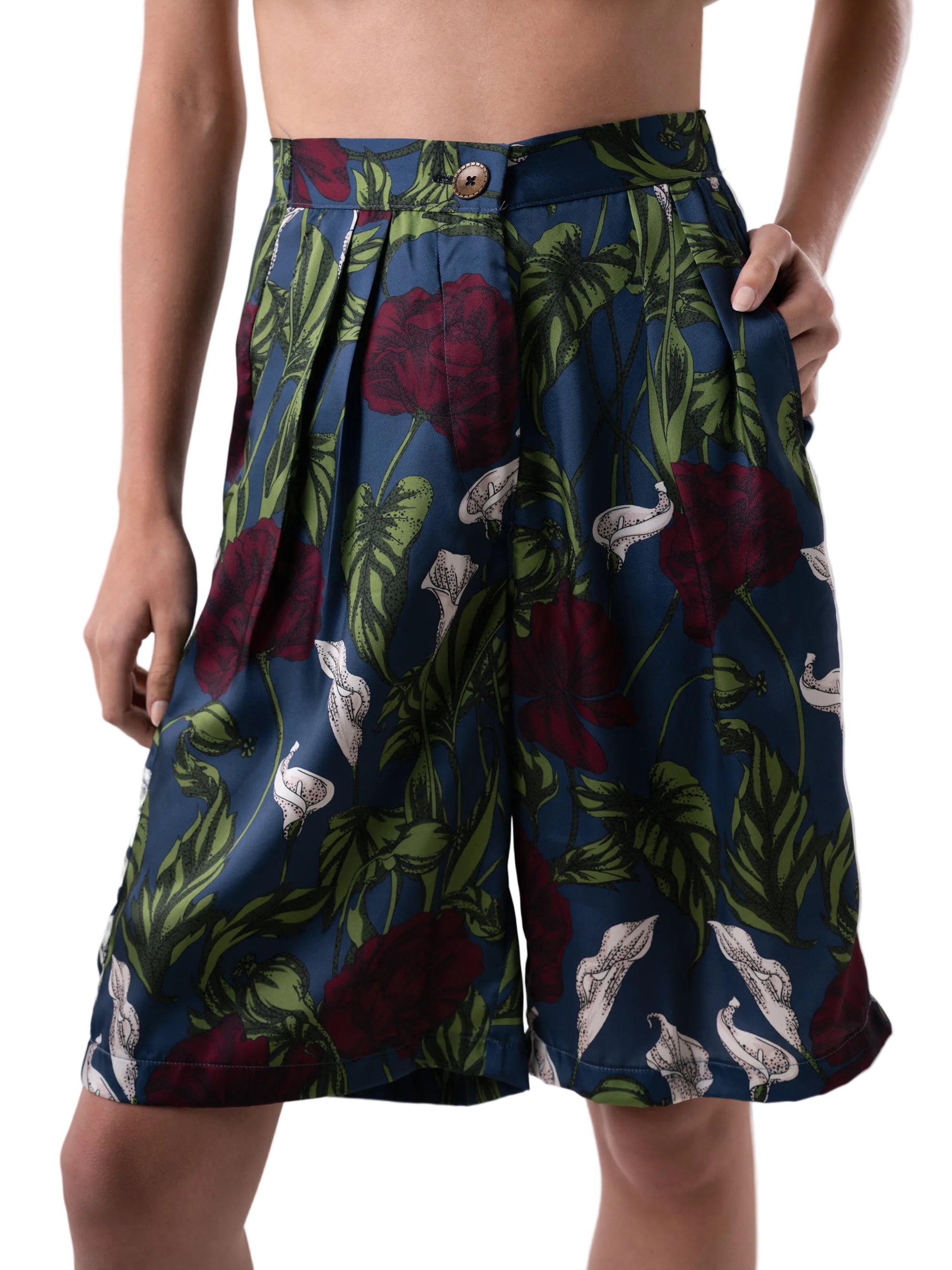 Bermudas that feature a high waisted silhouette with front pleats, and wide leg cut.