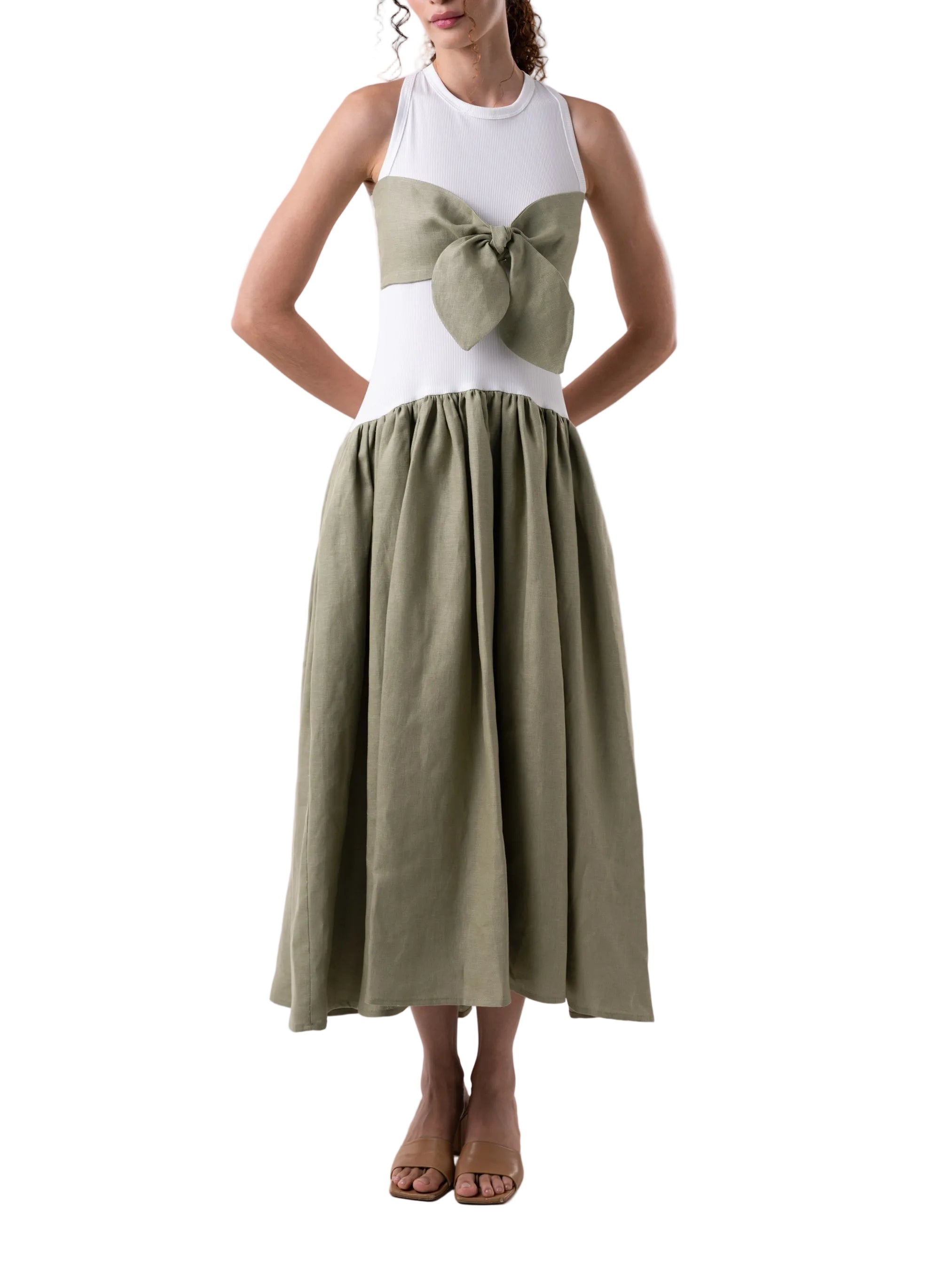 Dress that features a fitted knit silhouette with contrasting fabric gathered panel skirt, below the knee length and oversized knot detail at the chest.