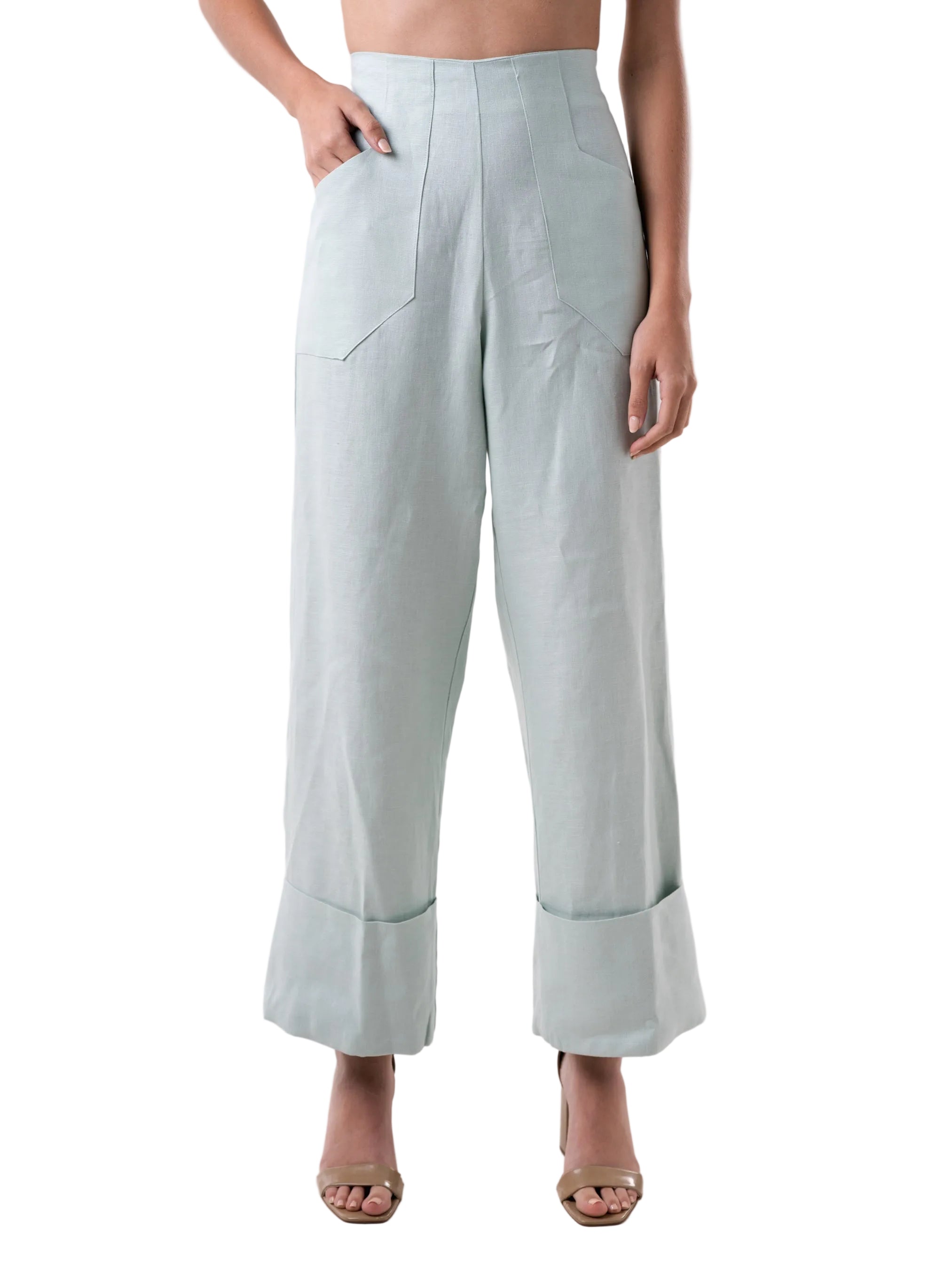 High waisted wide leg silhouette pant, with oversized cuff at the hem, front pockets.
