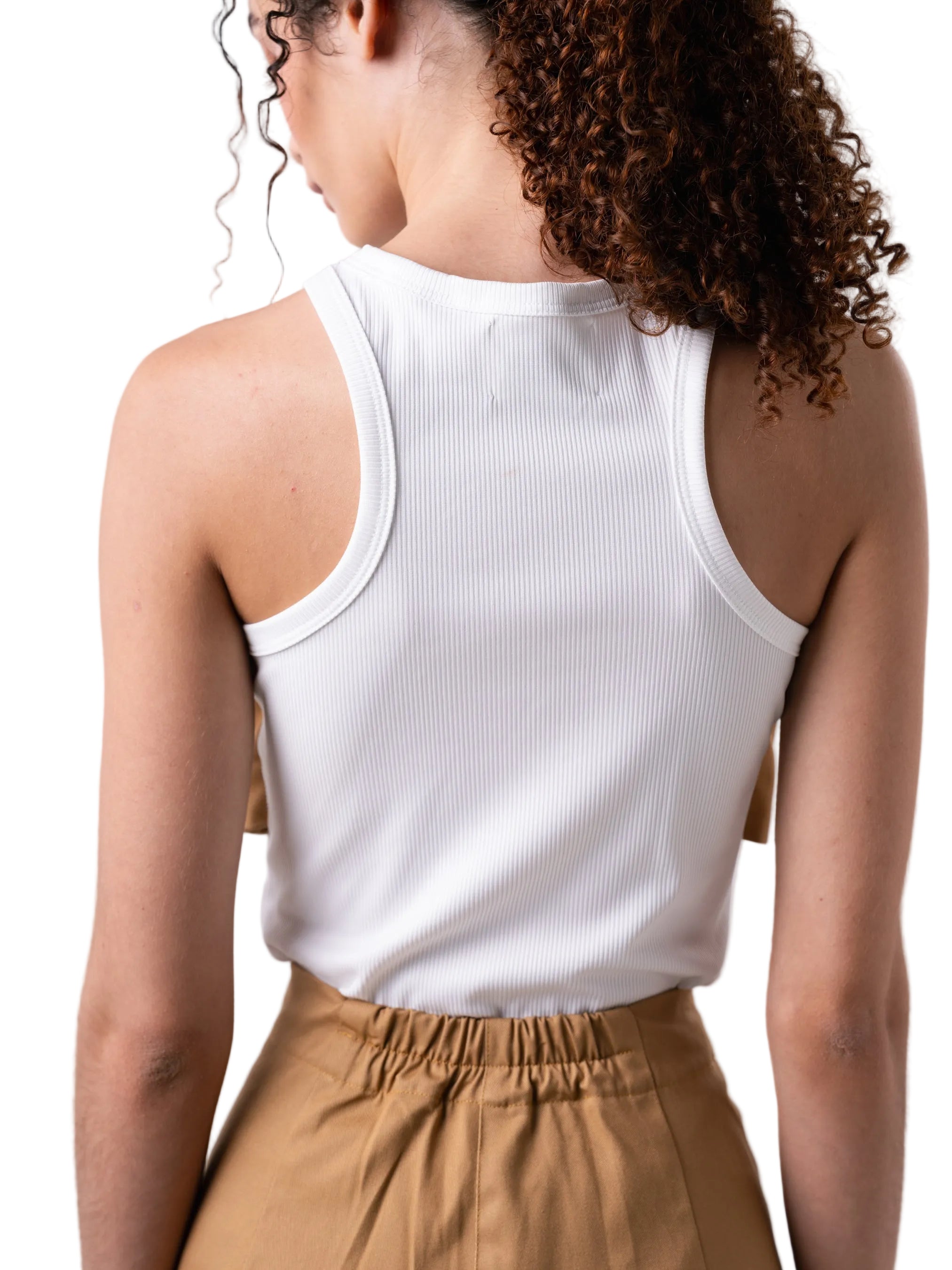 Tank that features a classic fitted round neck silhouette with oversized knot detail at the chest.
