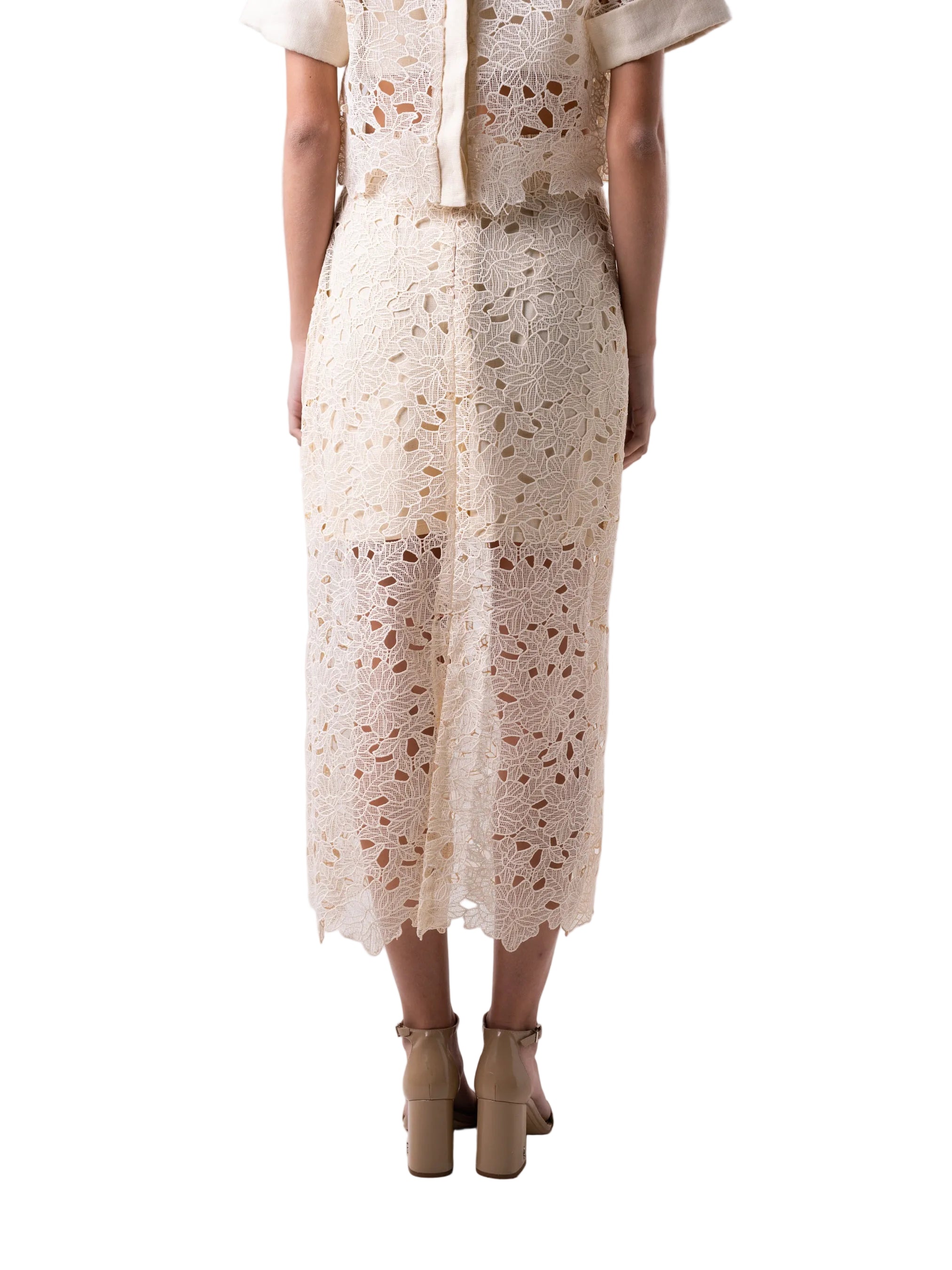 Skirt that features a below the knee length pencil style silhouette.