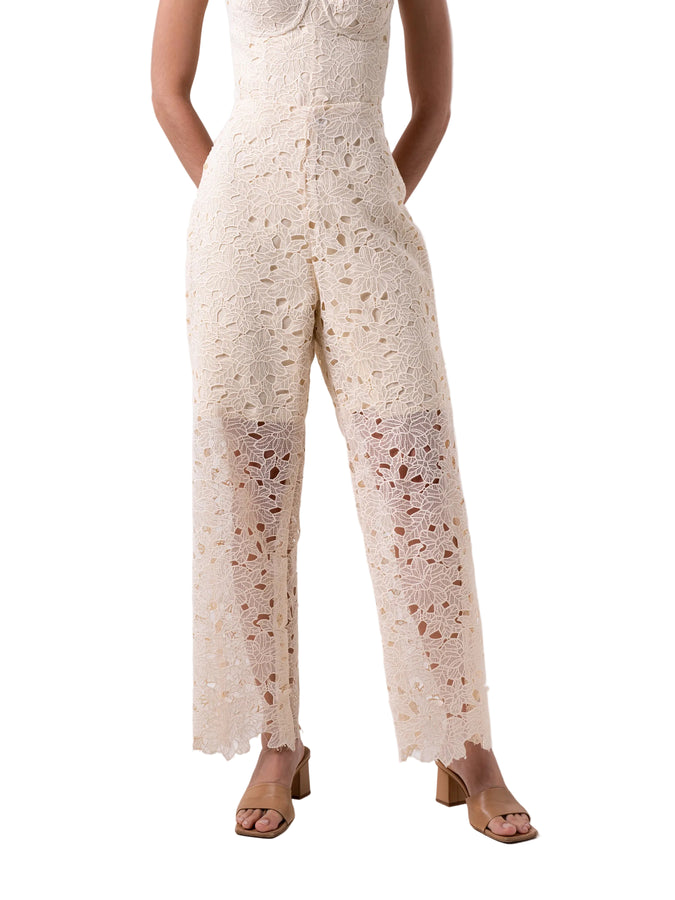 Pant that features a high waisted straight leg silhouette, with short lining and back zipper closure.