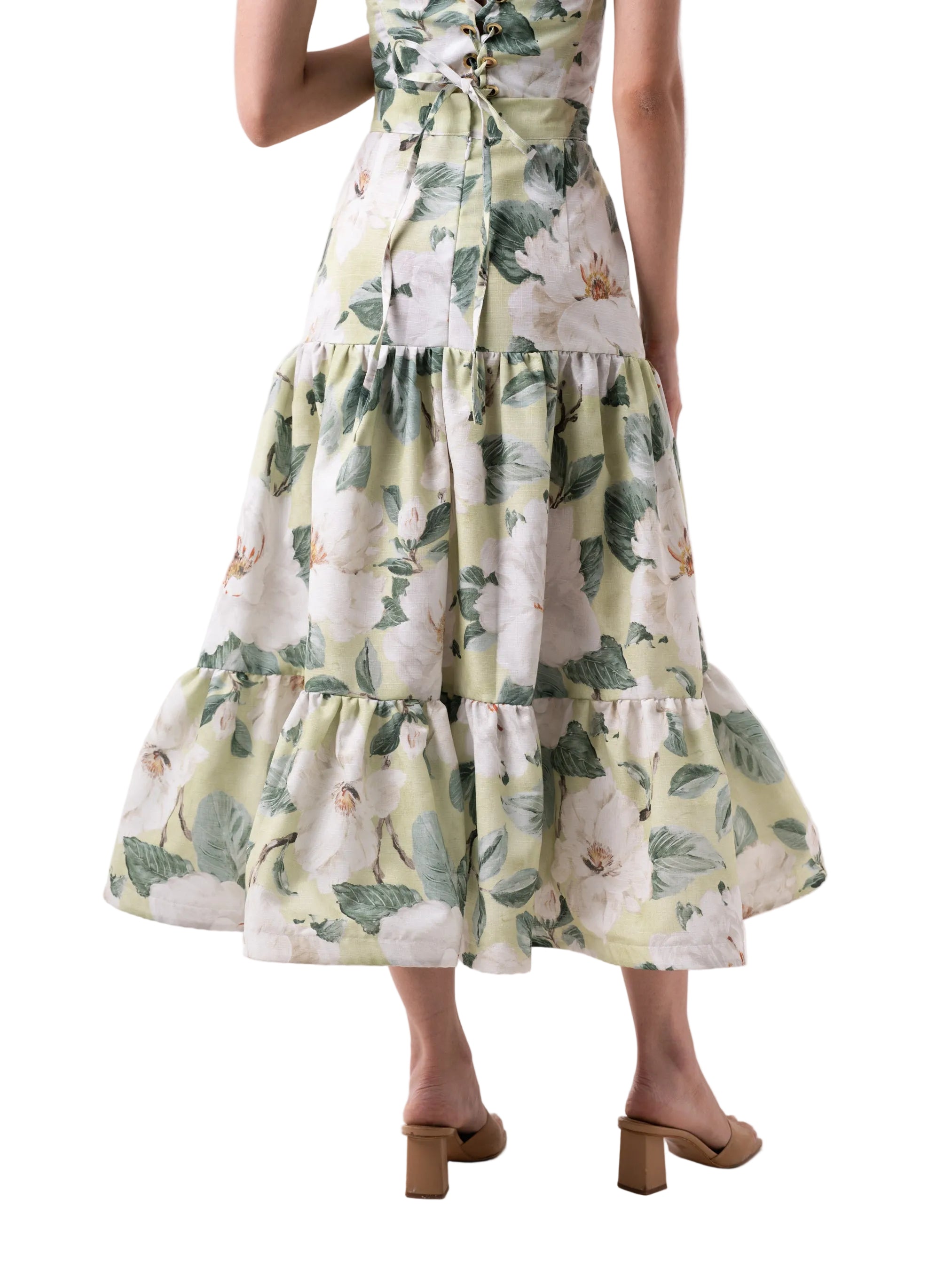 Skirt that features a high waisted ankle length silhouette, front pockets, with back zipper closure, and rushed two-tiered paneled skirt.