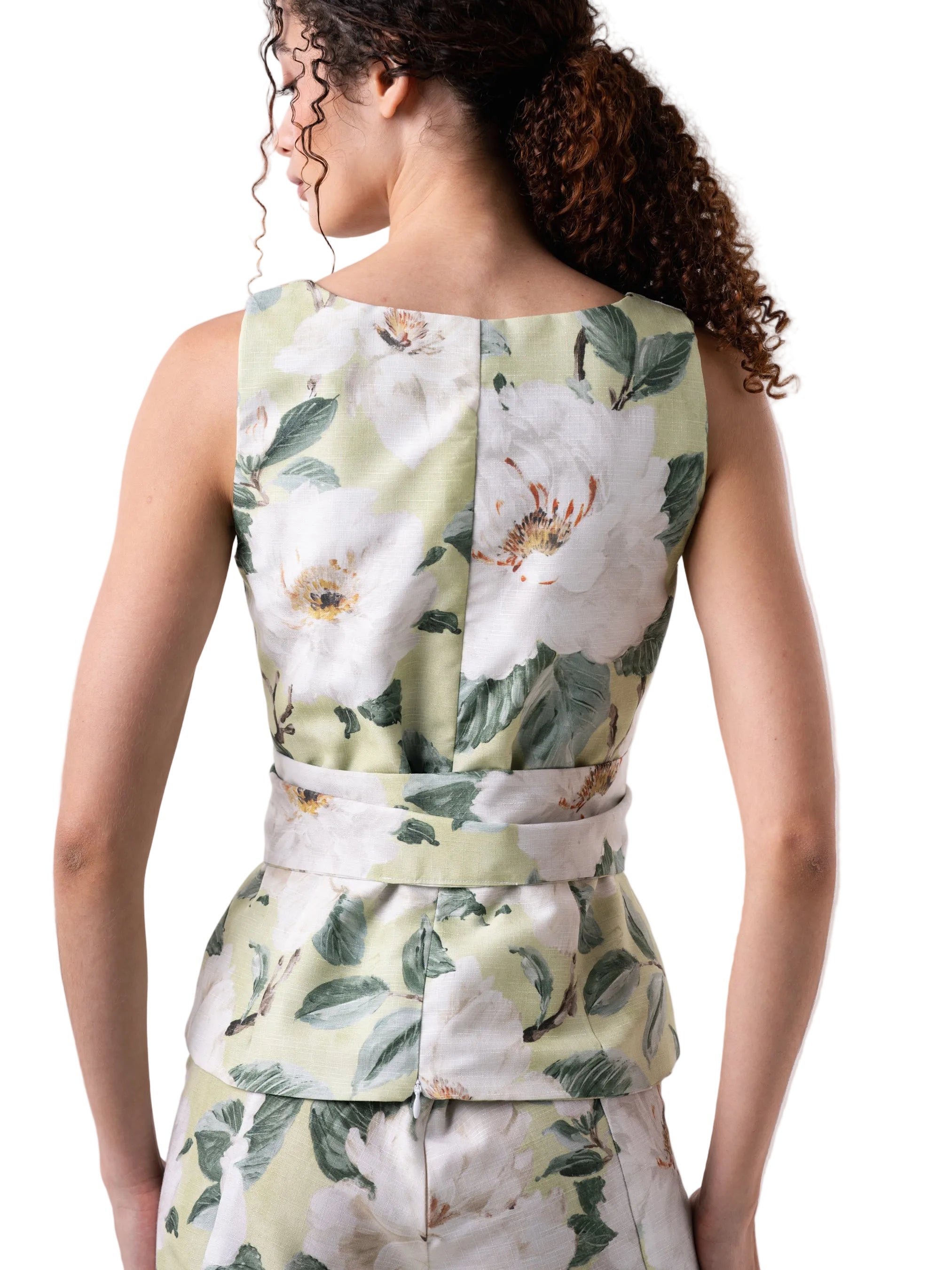 Top that features a sleeveless square neck, fitted silhouette with front hidden placket closure.