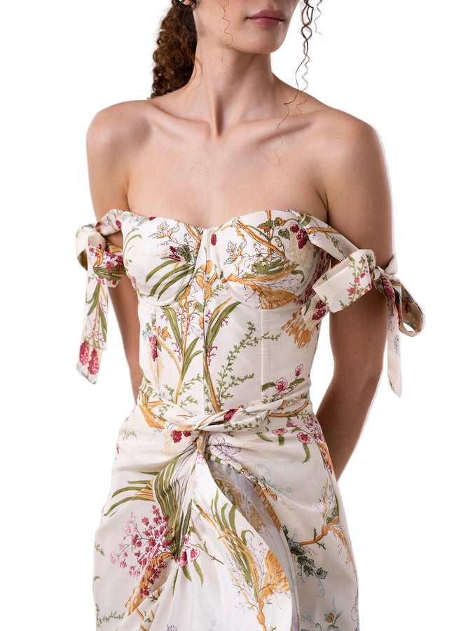 Bustier that features adjustable straps and back tie, bra cups, underwire and boning.