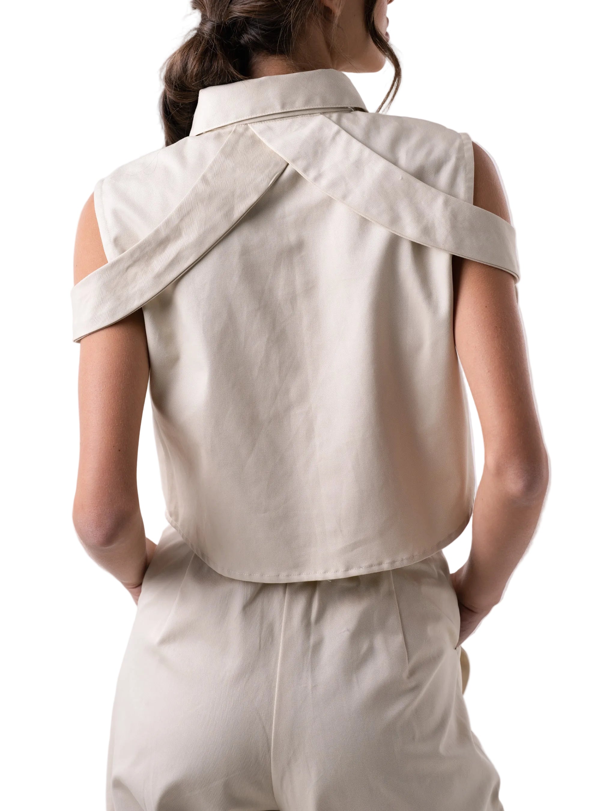 Boxy cropped top silhouette with collar and front placket, with off the shoulder straps.