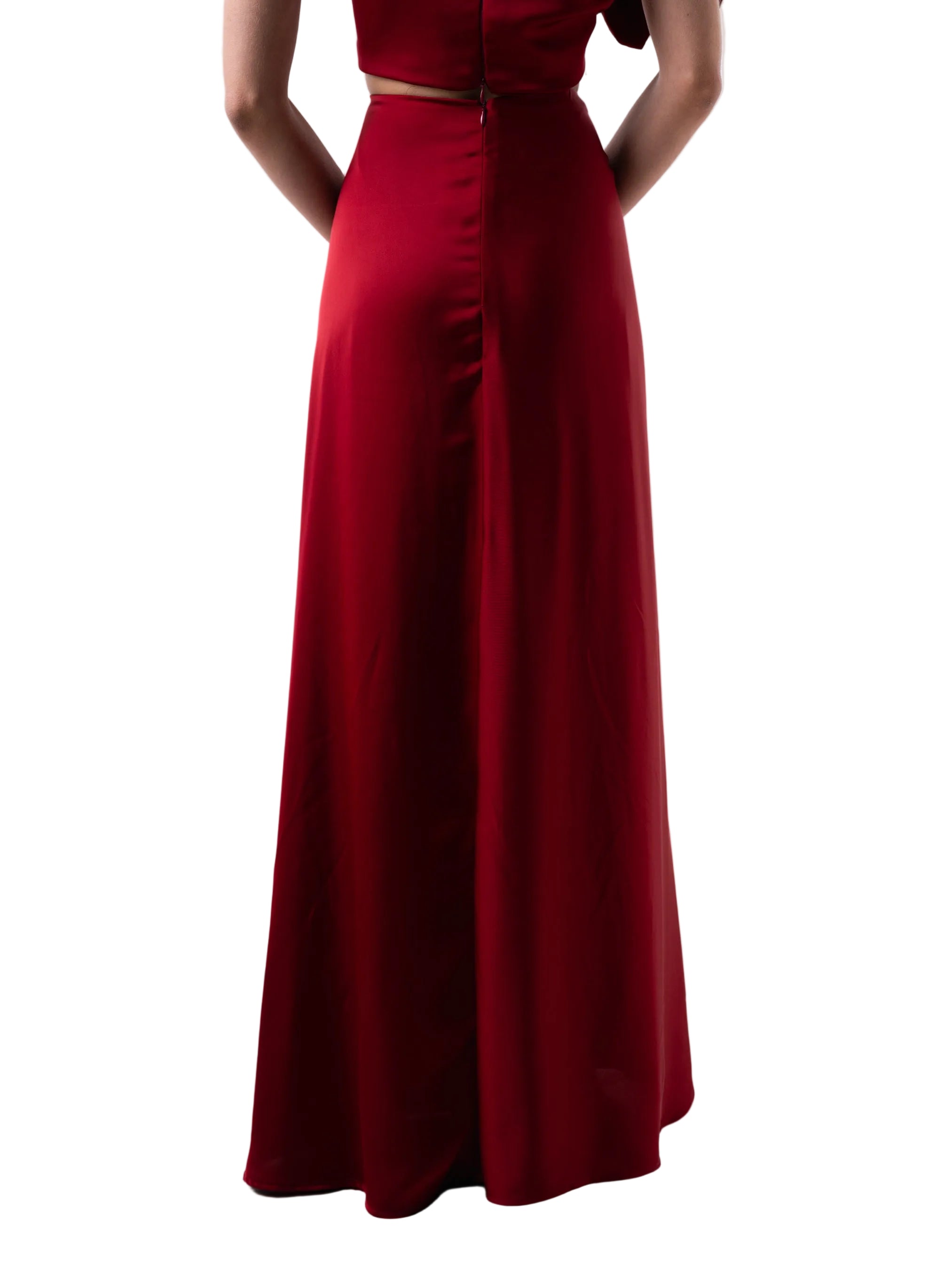 Skirt that features a high waisted A-Line silhouette with front gather and front petal knot detail.