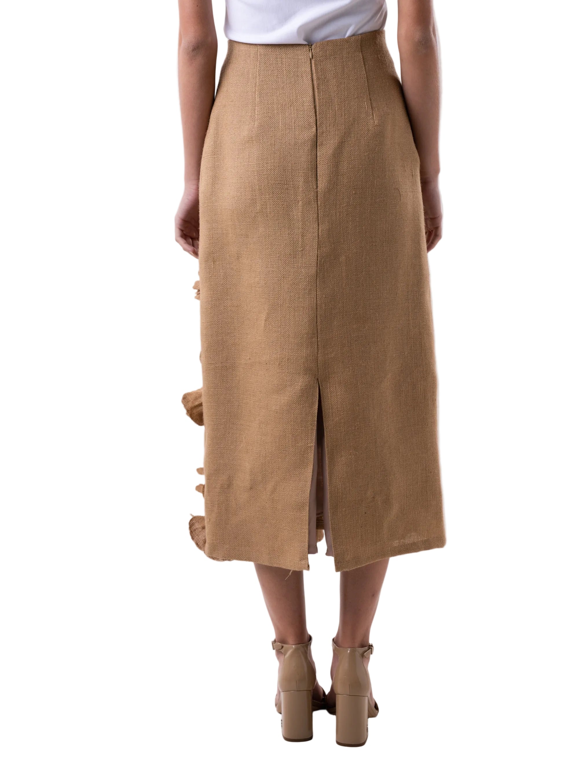 Skirt that features a high waisted pencil silhouette with hand embroidered fabric flowers.