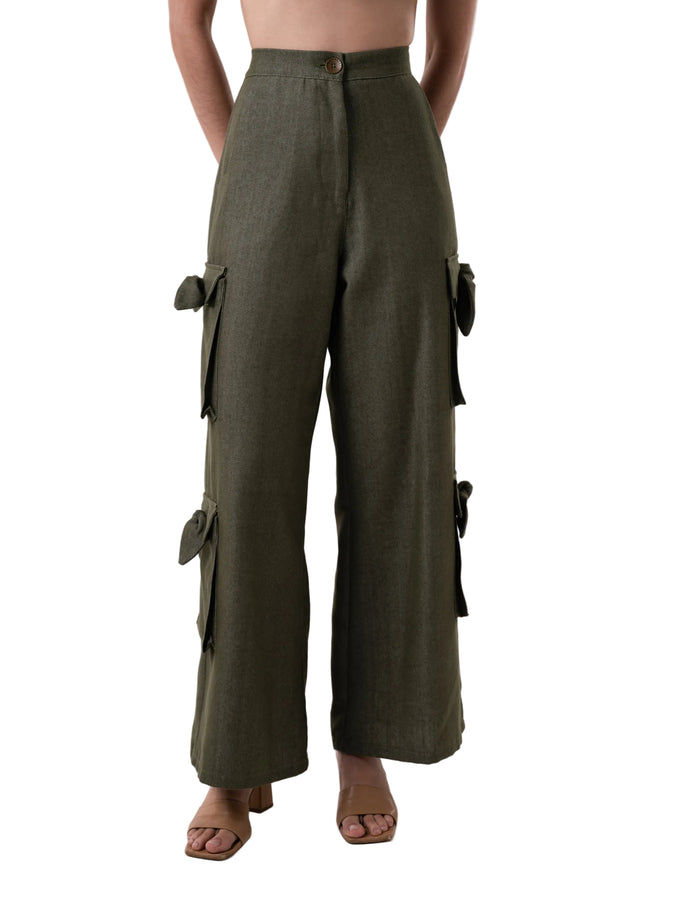 Pant that features a high waisted cargo style, front zipper, oversized pockets down the leg with knot details, comes with matching strap for styling at the ankle.
