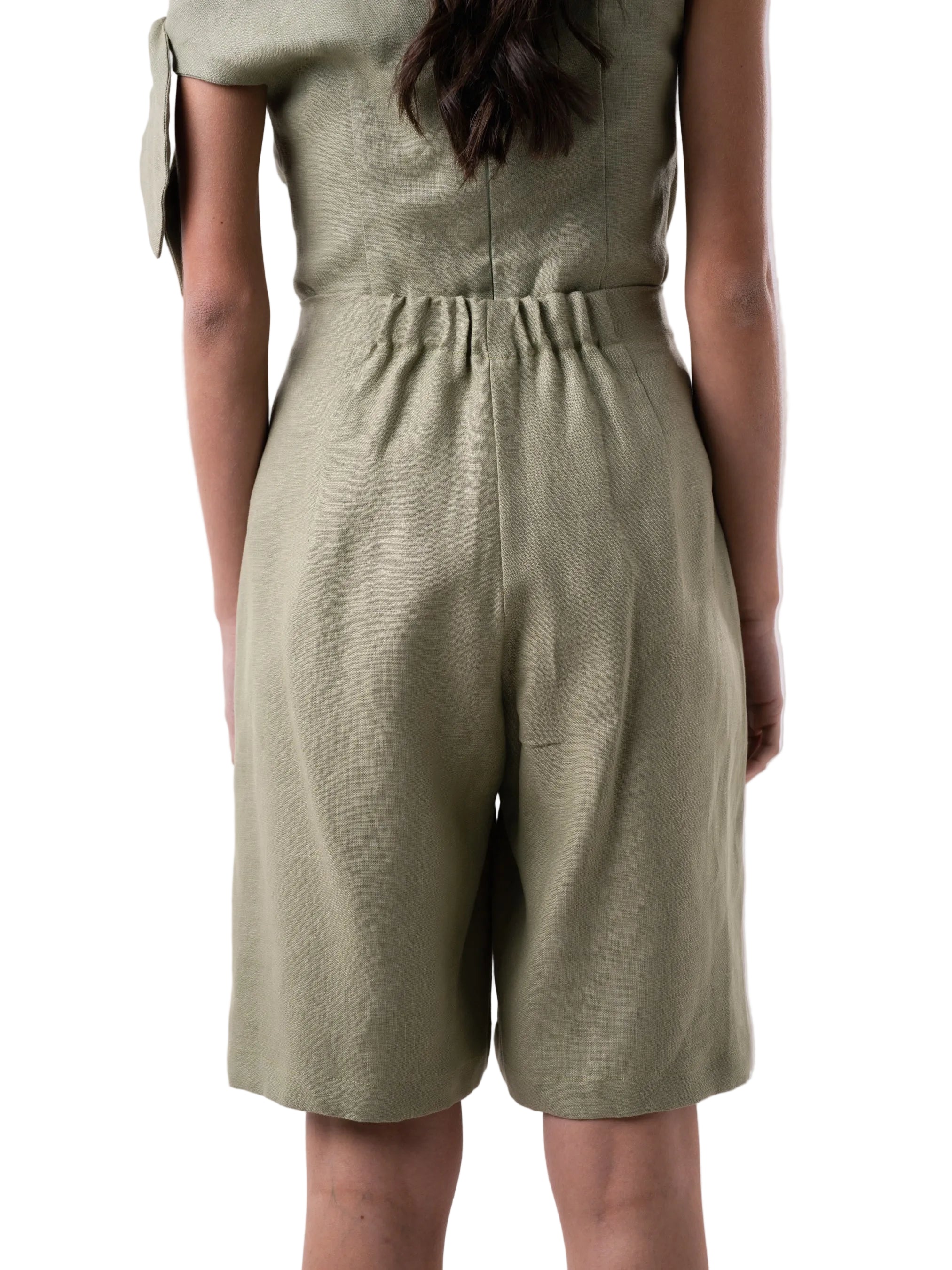 Bermudas that feature a high waisted silhouette with front pleats, and wide leg cut.