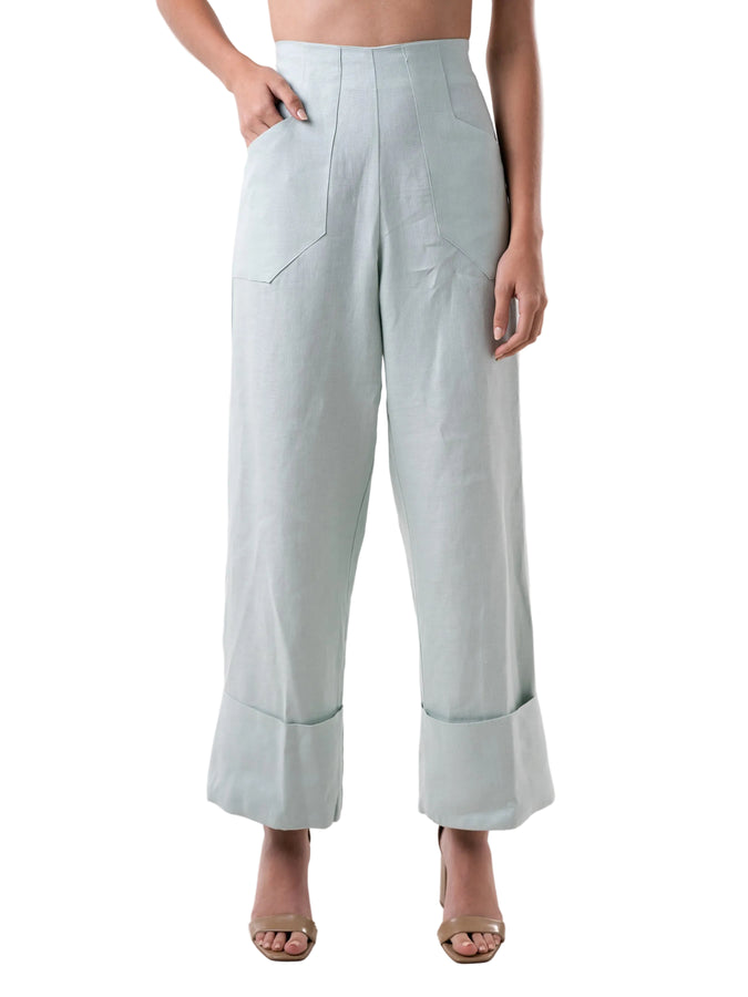 High waisted wide leg silhouette pant, with oversized cuff at the hem, front pockets.