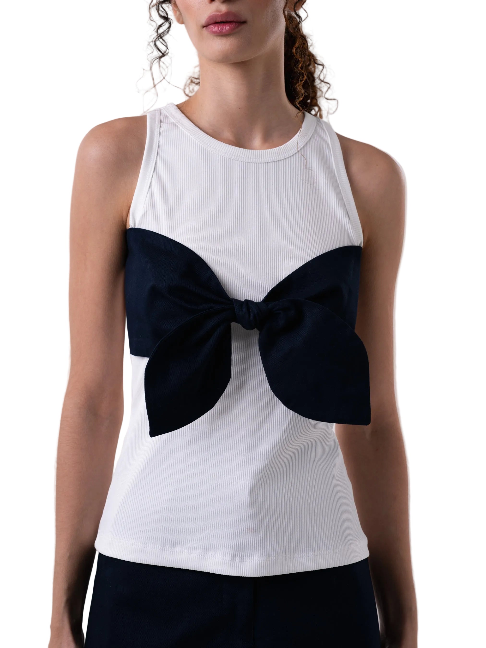 Tank features a classic fitted round neck silhouette with oversized knot detail at the chest.